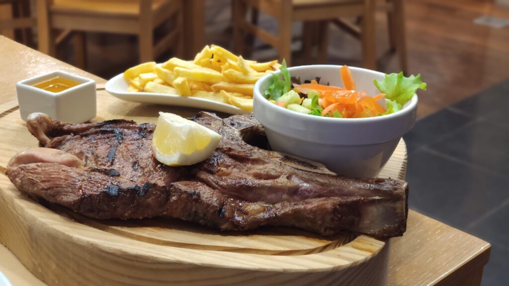 Steak, french fries and a salad