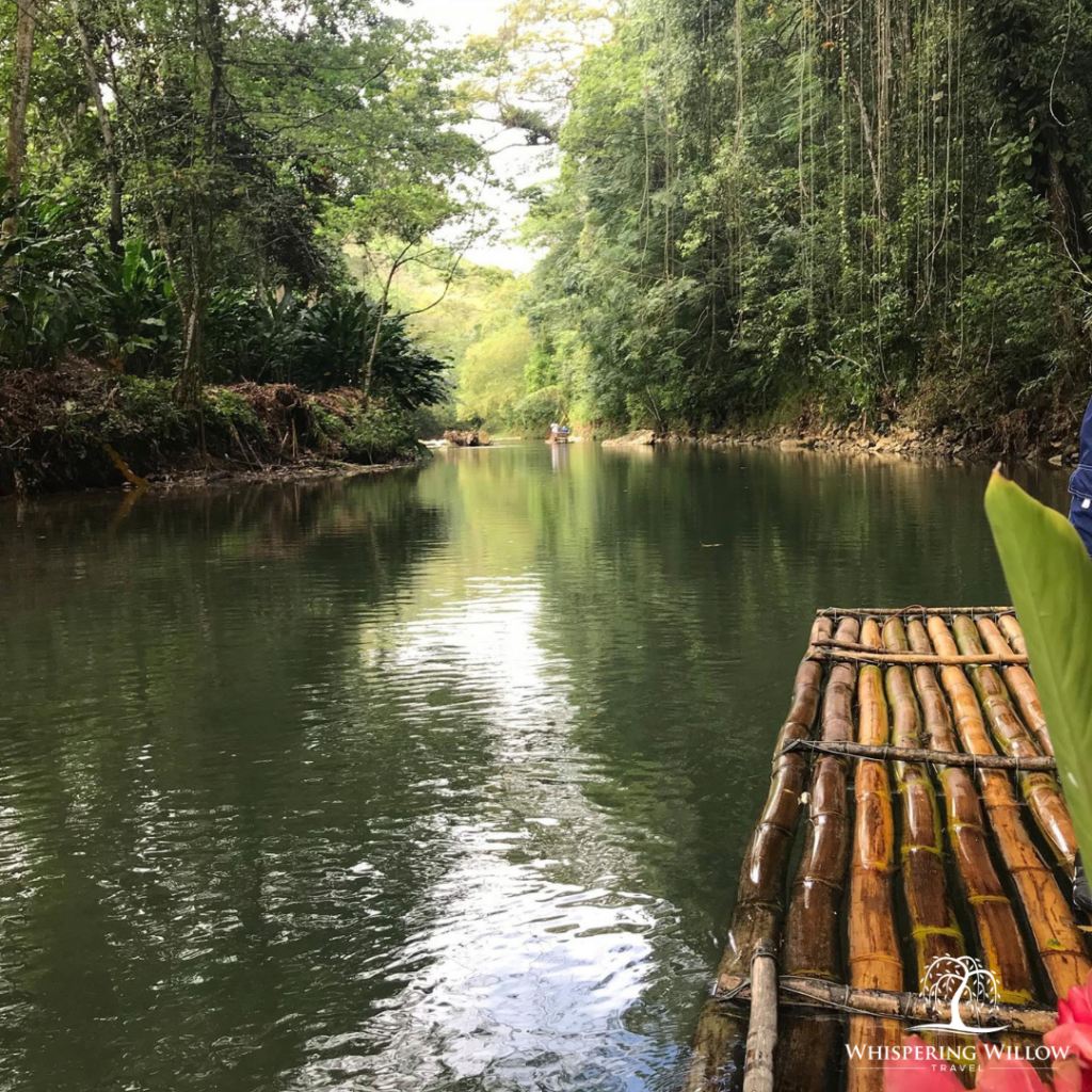 Black river with a small raft on it