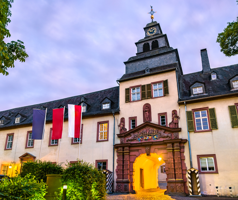 Hofburg Palace, building with Austrian flags on it.