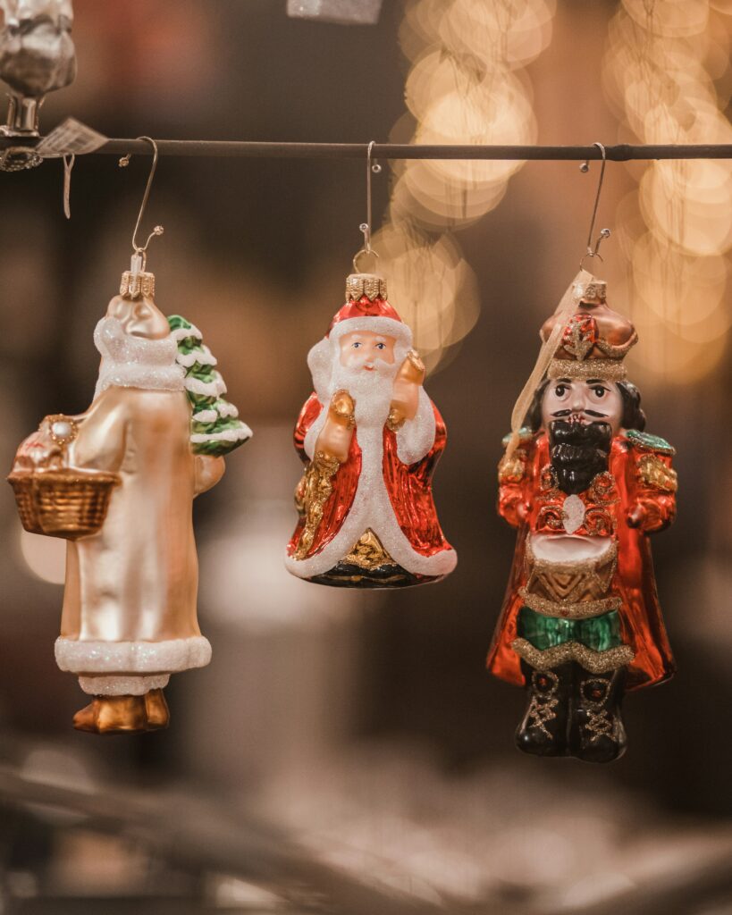 Christmas ornaments of Saint Nick & a wiseman