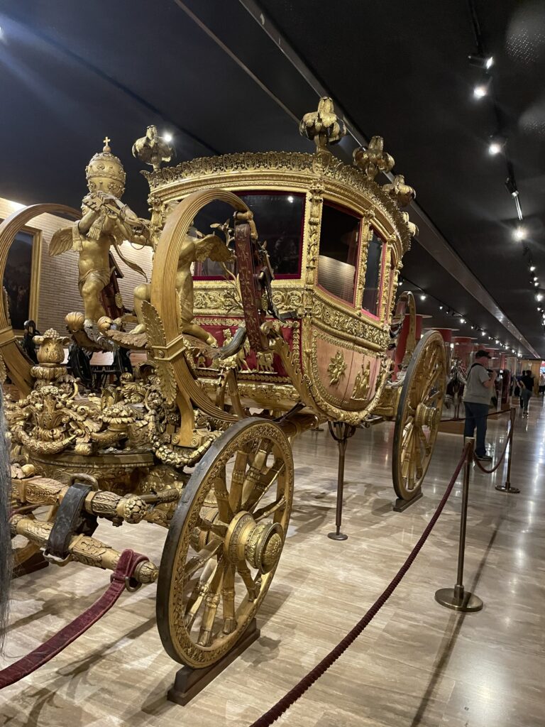 Papal carriage: 
"Rome and Florence itinerary Vatican papal carriage gold"