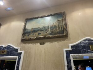 Waldorf elevator lobby painting: "Waldorf Astoria Rome elevator lobby Venetian waterfront painting"
