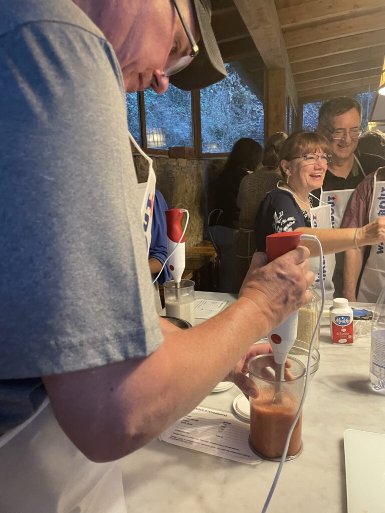 Pizza & Gelato class in Florence. Man making gelato during the class.