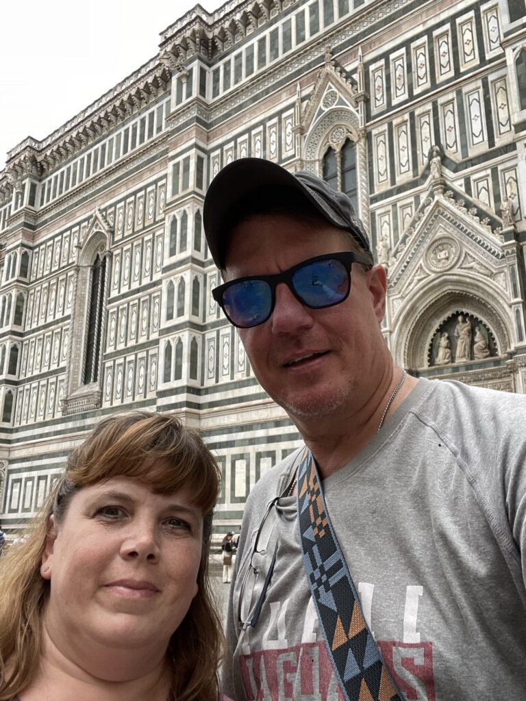 Couple in front of the Duomo in Florence Italy.