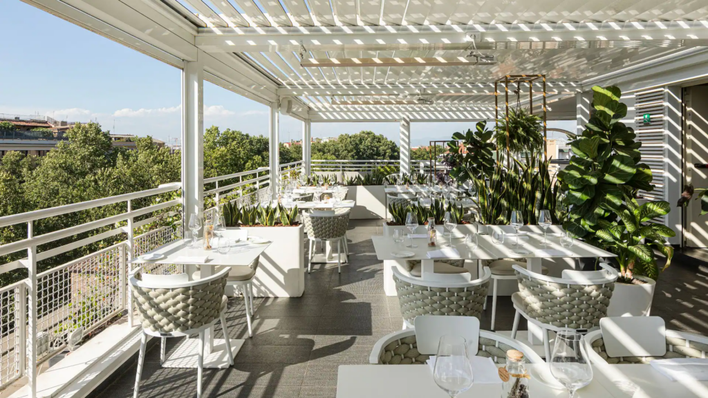 Tribune rooftop restaurant: "The Tribune Rome rooftop restaurant open air pergola city views"
