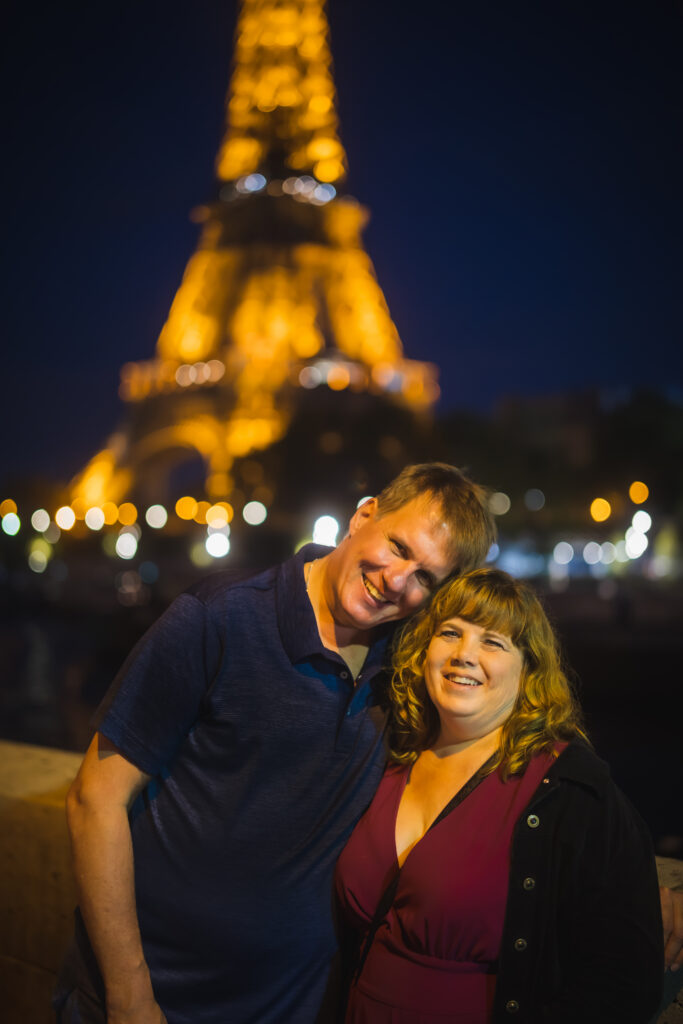 Paris anniversary trip Eiffel Tower couple