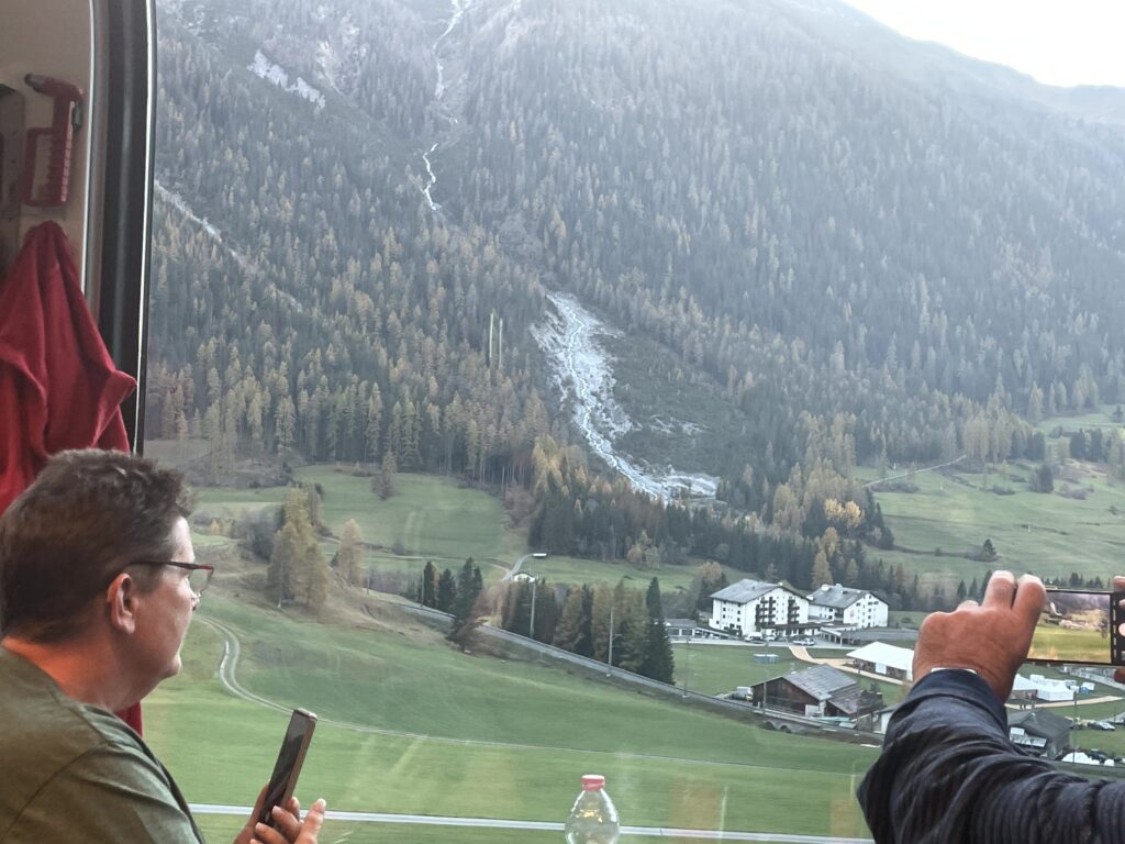 Swiss Alps mountain scenery Bernina Express train anniversary trip