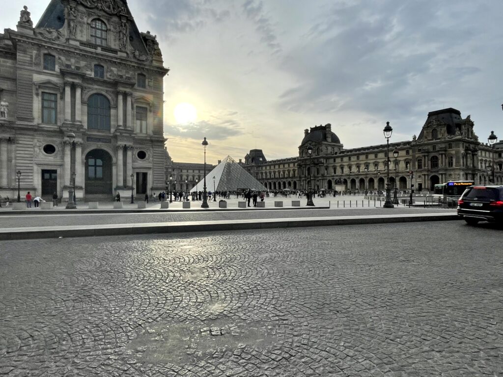 Louvre museum Paris exterior pyramid anniversary trip