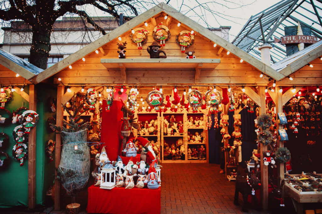 Christmas markets on the Danube with twinkling lights and holiday market stalls in a European port town
