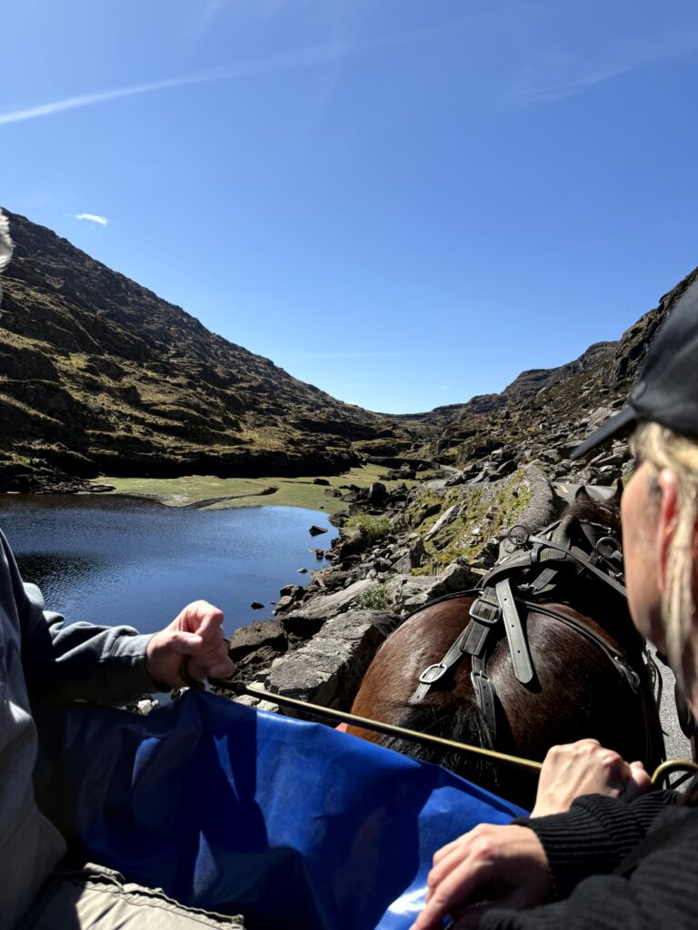 Horse-drawn jaunting car through the Gap of Dunloe in Killarney Ireland